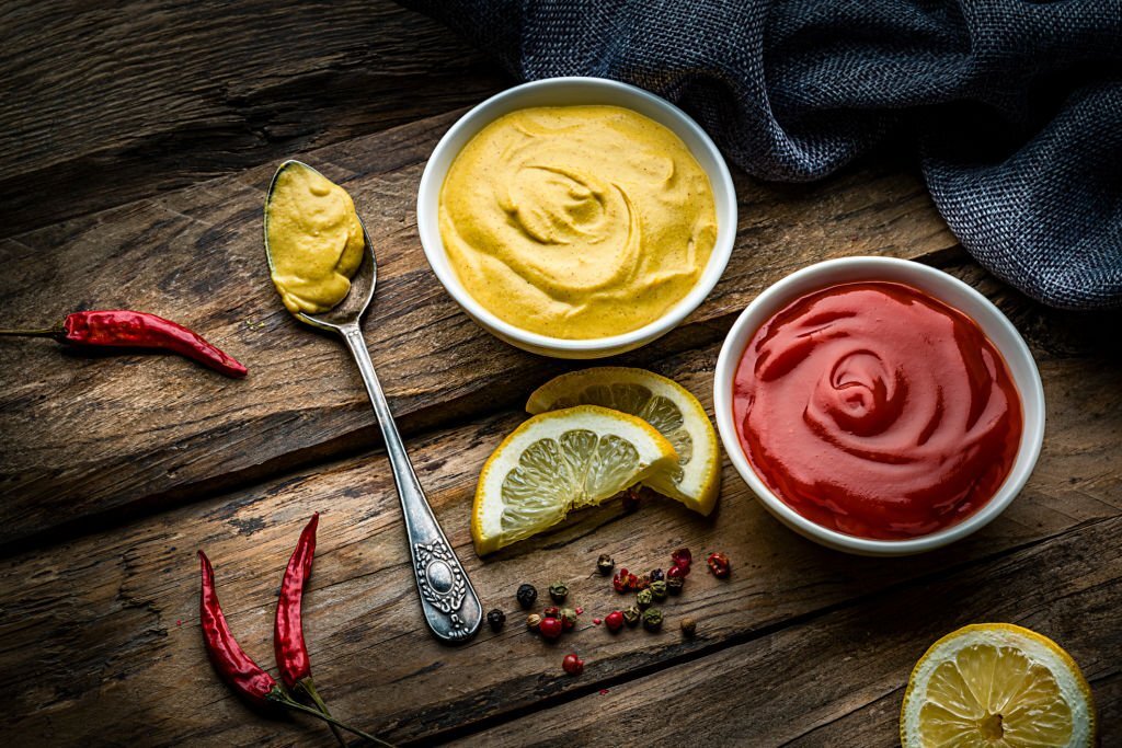 An image of ketchup and mustard, the history of ketchup, the history of mustard, the combination of mustard and ketchup , ketchup origins, mustard origins