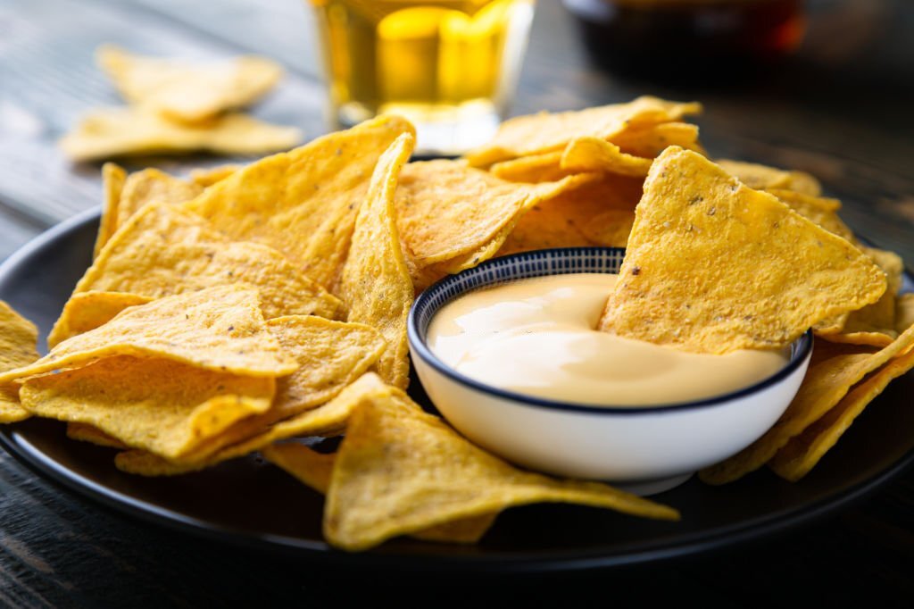 an image of nacho, the history of nacho, the history of tortilla chips